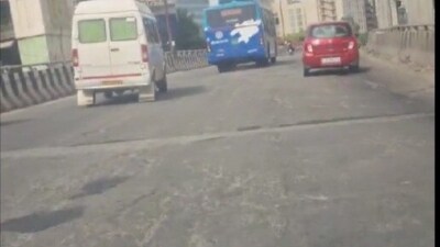 Pothole menace at Bengaluru's Ecospace flyover on Outer Ring Road. VIDEO Pothole menace at Bengaluru's Ecospace flyover on Outer Ring Road. VIDEO