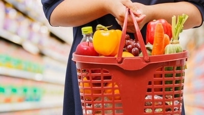 Try to snack on a fruit while grocery shopping. It will help you keep a check on the processed foods you buy. (Shutterstock) Try to snack on a fruit while grocery shopping. It will help you keep a check on the processed foods you buy. (Shutterstock)