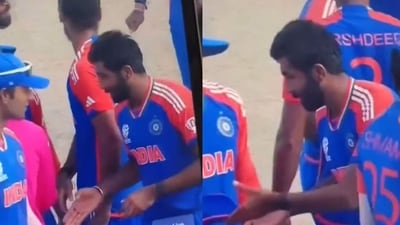 Jasprit Bumrah approaches the umpire for a handshake. Jasprit Bumrah approaches the umpire for a handshake.