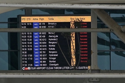 A screen showing cancelled flights is pictured at the Indira Gandhi International Airport after a part of terminal roof collapsed following heavy rains in New Delhi on June 28, 2024. (AFP) A screen showing cancelled flights is pictured at the Indira Gandhi International Airport after a part of terminal roof collapsed following heavy rains in New Delhi on June 28, 2024. (AFP)