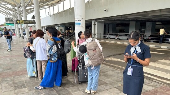 Delhi airport roof collapse: Passengers were seen waiting outside the Indira Gandhi International Airport in New Delhi. As a result of this incident, the spokesperson said all departures from Terminal 1 are temporarily suspended, and check-in counters are closed as a safety measure.(AP)