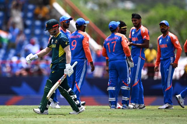 Australia's David Warner walks out after being dismissed at the Darren Sammy National Cricket Stadium in Gros Islet. (AFP) Australia's David Warner walks out after being dismissed at the Darren Sammy National Cricket Stadium in Gros Islet. (AFP)