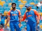 India's Jasprit Bumrah and Rohit Sharma (c) celebrate a wicket. India's Jasprit Bumrah and Rohit Sharma (c) celebrate a wicket.