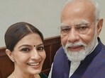 Varalaxmi Sarathkumar poses with Prime Minister Narendra Modi as she invited him to her wedding.