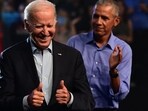 President Joe Biden (left) and former US president Barack Obama (right) rally for Pennsylvania Democratic Senate nominee John Fetterman and Democratic gubernatorial nominee Josh Shapiro at the Liacouras Center on Saturday in Philadelphia. (AFP)