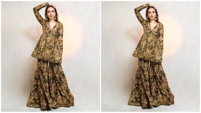 Assisted by celebrity fashion stylist Sanam Ratansi, Aditi accessorised her glamorous look with a pair of silver jhumka earrings and high heels, perfectly complementing her ethnic ensemble. (Instagram/@sanamratansi) Assisted by celebrity fashion stylist Sanam Ratansi, Aditi accessorised her glamorous look with a pair of silver jhumka earrings and high heels, perfectly complementing her ethnic ensemble. (Instagram/@sanamratansi)