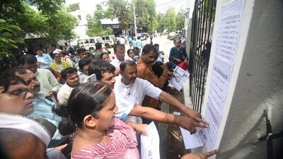 Aspirants search their roll number before entering an examination center to appear for the Head Master exam conduct by Bihar Public Service Commission, in Patna. (Santosh Kumar) Aspirants search their roll number before entering an examination center to appear for the Head Master exam conduct by Bihar Public Service Commission, in Patna. (Santosh Kumar)