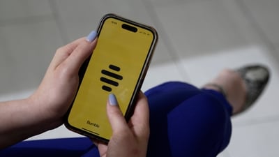 A person uses the dating app Bumble in this image. (AP) A person uses the dating app Bumble in this image. (AP)