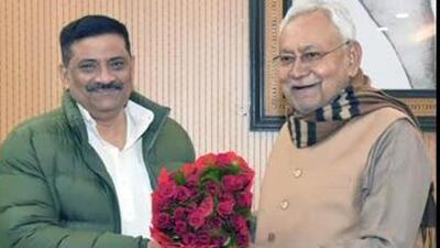 Bihar chief minister Nitish Kumar with JD(U) leader Sanjay Jha. (File) Bihar chief minister Nitish Kumar with JD(U) leader Sanjay Jha. (File)