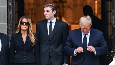 (FILES) Former US President Donald Trump and his son Barron Trump attend the funeral of former first lady Melania Trump's mother Amalija Knavs, at Bethesda by the Sea Church, in Palm Beach, Florida, on January 18, 2023. The US Republican Party has named Donald Trump's 18 year-old son Barron as a Florida delegate to its national convention, propelling another member of the family into the spotlight. (Photo by GIORGIO VIERA / AFP) (AFP) (FILES) Former US President Donald Trump and his son Barron Trump attend the funeral of former first lady Melania Trump's mother Amalija Knavs, at Bethesda by the Sea Church, in Palm Beach, Florida, on January 18, 2023. The US Republican Party has named Donald Trump's 18 year-old son Barron as a Florida delegate to its national convention, propelling another member of the family into the spotlight. (Photo by GIORGIO VIERA / AFP) (AFP)