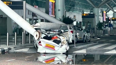 Parked vehicles are damaged by the collapse of a departure terminal canopy at New Delhi's Indira Gandhi International Airport (AP) Parked vehicles are damaged by the collapse of a departure terminal canopy at New Delhi's Indira Gandhi International Airport (AP)