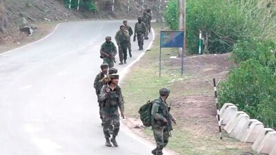 Reasi: Security personnel during a search operation after a bus carrying pilgrims was ambushed by terrorists, in Reasi district of Jammu and Kashmir, Monday, June 10, 2024. At least 9 people were killed and 33 others suffered injuries in the terror attack on the bus, according to officials. (PTI Photo) (PTI) Reasi: Security personnel during a search operation after a bus carrying pilgrims was ambushed by terrorists, in Reasi district of Jammu and Kashmir, Monday, June 10, 2024. At least 9 people were killed and 33 others suffered injuries in the terror attack on the bus, according to officials. (PTI Photo) (PTI)