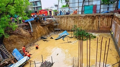 The two-storey basement, which was dug up for nearly 20 feet, was covered with at least 10-feet of water, slush, collapsed parts of temporary structures and a couple of trees. (Vipin Kumar/ Hindustan Times) The two-storey basement, which was dug up for nearly 20 feet, was covered with at least 10-feet of water, slush, collapsed parts of temporary structures and a couple of trees. (Vipin Kumar/ Hindustan Times)