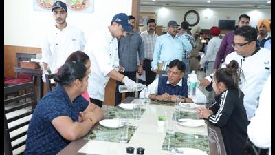 Union sports minister Mansukh Mandaviya interacts with players at the National Institute of Sports in Patiala on Saturday.