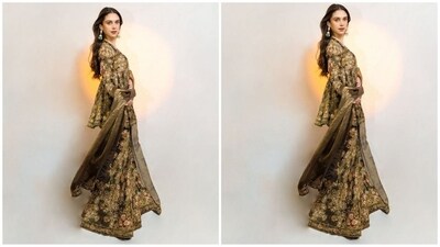 If you loved Aditi's outfit and are wondering about the cost, we've got you covered. Her attire is from the shelves of the brand Print by Radhika and comes with a price tag of <span class='webrupee'>₹</span>115,000. (Instagram/@sanamratansi) If you loved Aditi's outfit and are wondering about the cost, we've got you covered. Her attire is from the shelves of the brand Print by Radhika and comes with a price tag of <span class='webrupee'>₹</span>115,000. (Instagram/@sanamratansi)