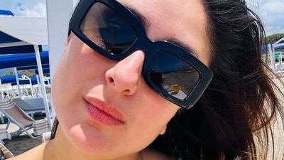 Kareena Kapoor soaked up the sun in blue swimwear at a beach but the photobomber – Saif Ali Khal – stole the limelight. The actor shared a series of selfies, and wrote in her caption, "For me it’s the one with the photobomber..." Saif walked in the background as Kareena posed away in one of the candid photos. Kareena Kapoor soaked up the sun in blue swimwear at a beach but the photobomber – Saif Ali Khal – stole the limelight. The actor shared a series of selfies, and wrote in her caption, "For me it’s the one with the photobomber..." Saif walked in the background as Kareena posed away in one of the candid photos.