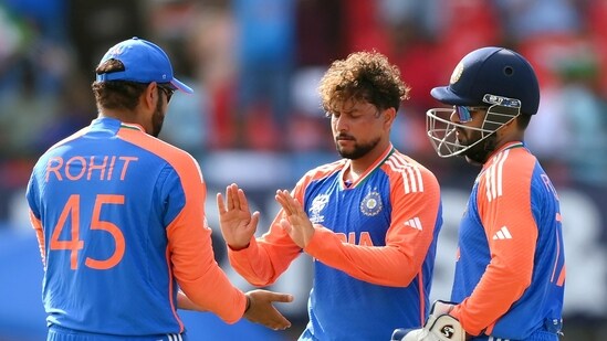 India's captain Rohit Sharma and Kuldeep Yadav celebrate a wicket during the semi-final match against England in the ICC Mens T20 World Cup 2024 (BCCI-X)