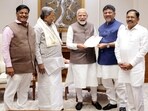 Karnataka Chief Minister Siddaramaiah and Deputy CM DK Shivakumar meet Prime Minister Narendra Modi, in New Delhi on Saturday. (ANI Photo)