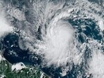 This National Oceanic and Atmospheric Administration (NOAA)/GOES satellite handout image shows Tropical Storm Beryl at 19:30UTC on June 29, 2024. Much of the southeast Caribbean went on alert Saturday as Tropical Storm Beryl was set to undergo rapid strengthening, becoming a "dangerous" major hurricane before it crosses the Windward Islands sometimes on June 30, forecasters said. This National Oceanic and Atmospheric Administration (NOAA)/GOES satellite handout image shows Tropical Storm Beryl at 19:30UTC on June 29, 2024. Much of the southeast Caribbean went on alert Saturday as Tropical Storm Beryl was set to undergo rapid strengthening, becoming a "dangerous" major hurricane before it crosses the Windward Islands sometimes on June 30, forecasters said.