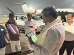 L K Atheeq, the CM's Additional Chief Secretary, posted a picture of the Congress stalwart enjoying a few moments of the thrilling match before boarding the flight. L K Atheeq, the CM's Additional Chief Secretary, posted a picture of the Congress stalwart enjoying a few moments of the thrilling match before boarding the flight.