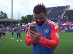 Virat Kohli during his video call with Anushka Sharma and kids after T20 World Cup win Virat Kohli during his video call with Anushka Sharma and kids after T20 World Cup win