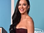 Bride stunned after Katy Perry greeted and high-fived her on her wedding day while leaving Paris Fashion Week. (Photo by Jordan Strauss/Invision/AP)