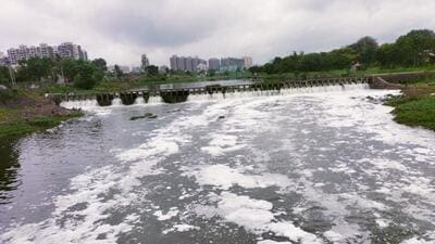 (In photo) Foam seen on Indrayani river. The pollution control board has also asked the PCMC to improve the functioning of its Sewage Treatment Plant (STP) in Kudalwadi. (HT PHOTO) (In photo) Foam seen on Indrayani river. The pollution control board has also asked the PCMC to improve the functioning of its Sewage Treatment Plant (STP) in Kudalwadi. (HT PHOTO)