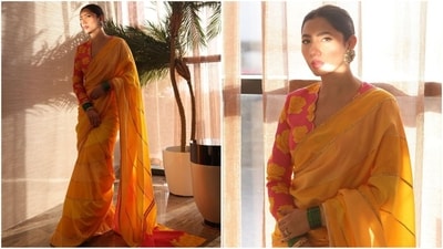 Mahira Khan's yellow saree features intricate golden sequin detailing. She draped it elegantly, letting the pallu fall gracefully from her shoulders. Paired with a pink full-sleeved blouse adorned with yellow roses, she looked simply stunning. (Instagram/@mahirahkhan) Mahira Khan's yellow saree features intricate golden sequin detailing. She draped it elegantly, letting the pallu fall gracefully from her shoulders. Paired with a pink full-sleeved blouse adorned with yellow roses, she looked simply stunning. (Instagram/@mahirahkhan)