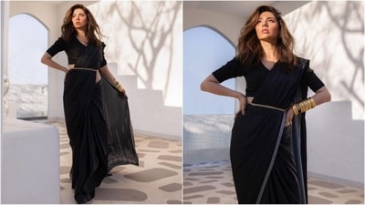 Saree with a belt? Yes, you heard that right. Mahira effortlessly styled a black saree with a golden belt cinched at her waist. Paired with golden stacked bangles, she rocked the six yards with style. (Instagram/@mahirahkhan) Saree with a belt? Yes, you heard that right. Mahira effortlessly styled a black saree with a golden belt cinched at her waist. Paired with golden stacked bangles, she rocked the six yards with style. (Instagram/@mahirahkhan)