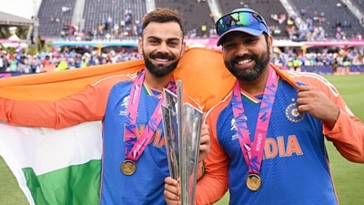 Barbados, Jun 30 (ANI): India's captain Rohit Sharma and Virat Kohli pose for a picture with the trophy after Team India wins the ICC Mens T20 World Cup 2024 final match against South Africa, at Kensington Oval in Barbados on Saturday. (ANI Photo) (ICC - X ) Barbados, Jun 30 (ANI): India's captain Rohit Sharma and Virat Kohli pose for a picture with the trophy after Team India wins the ICC Mens T20 World Cup 2024 final match against South Africa, at Kensington Oval in Barbados on Saturday. (ANI Photo) (ICC - X )