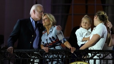 President Joe Biden kisses first lady Jill Biden during a fireworks show at a Fourth of July celebration at the White House in Washington, Tuesday, July 4, 2023. (AP Photo/Susan Walsh) (AP) President Joe Biden kisses first lady Jill Biden during a fireworks show at a Fourth of July celebration at the White House in Washington, Tuesday, July 4, 2023. (AP Photo/Susan Walsh) (AP)