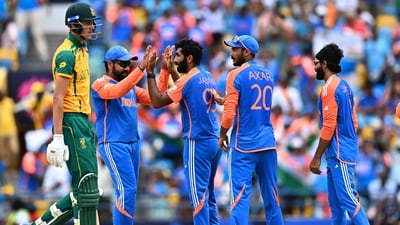 India's Jasprit Bumrah (C) celebrates with teammates. (AFP) India's Jasprit Bumrah (C) celebrates with teammates. (AFP)