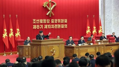 North Korea's leader Kim Jong Un (centre L) taking part in the second day of the 10th enlarged plenary session of the 8th Central Committee of the Workers' Party of Korea (AFP) North Korea's leader Kim Jong Un (centre L) taking part in the second day of the 10th enlarged plenary session of the 8th Central Committee of the Workers' Party of Korea (AFP)