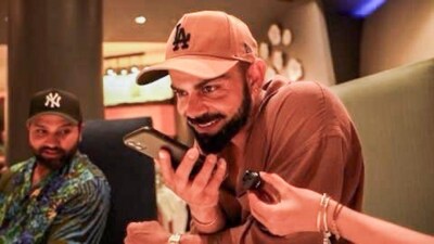 Indian cricketer Virat Kohli speaks on the phone during a call with Prime Minister Narendra Modi after winning the ICC Men�s T20 World Cup 2024. (PTI) Indian cricketer Virat Kohli speaks on the phone during a call with Prime Minister Narendra Modi after winning the ICC Men�s T20 World Cup 2024. (PTI)