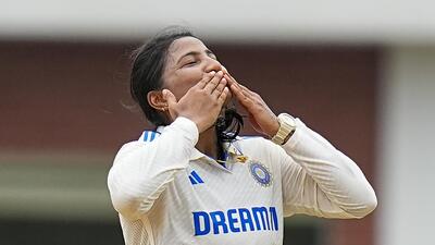 Sneh Rana celebrates one of her eight wickets in the first innings in Chennai on Sunday. (PTI)