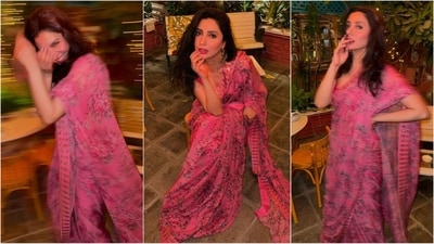 Mahira Khan's pink ruffled saree, adorned with captivating floral prints, serves as perfect inspiration for summer. Styled with a sleeveless blouse and statement earrings, she exudes oomph. (Instagram/@mahirahkhan) Mahira Khan's pink ruffled saree, adorned with captivating floral prints, serves as perfect inspiration for summer. Styled with a sleeveless blouse and statement earrings, she exudes oomph. (Instagram/@mahirahkhan)
