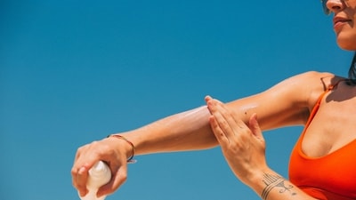 Sunscreen should be applied to dry skin 15 minutes before going outdoors and then re-applied at least every two hours, and after swimming or sweating. (Pexels) Sunscreen should be applied to dry skin 15 minutes before going outdoors and then re-applied at least every two hours, and after swimming or sweating. (Pexels)