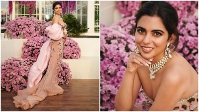 This second ensemble for the Jamnagar celebrations is a custom look from Miss Sohee. The Korean designer Sohee Park created her own iteration of the lehenga choli for Isha. The blush-coloured tulle ensemble features embroidered cherry blossoms on the bodice and a sculpted cape that gently grazes the floor. (Instagram) This second ensemble for the Jamnagar celebrations is a custom look from Miss Sohee. The Korean designer Sohee Park created her own iteration of the lehenga choli for Isha. The blush-coloured tulle ensemble features embroidered cherry blossoms on the bodice and a sculpted cape that gently grazes the floor. (Instagram)