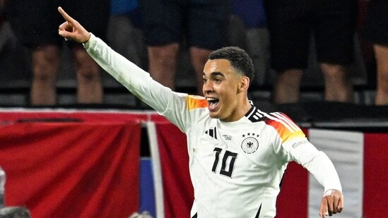 Germany's midfielder Jamal Musiala celebrates scoring. (AFP)