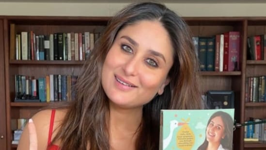 Kareena Kapoor poses with her book, Kareena Kapoor Khan's Pregnancy Bible, which was first published in 2021. (File Photo)