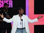 Usher gestures after accepting the Lifetime Achievement award during the 2024 BET Awards at Peacock Theater in Los Angeles, California, U.S., June 30, 2024. 