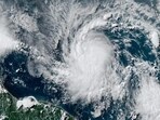 This National Oceanic and Atmospheric Administration (NOAA)/GOES satellite handout image shows Tropical Storm Beryl at 19:30UTC on June 29, 2024. This National Oceanic and Atmospheric Administration (NOAA)/GOES satellite handout image shows Tropical Storm Beryl at 19:30UTC on June 29, 2024.