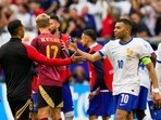 France's Kylian Mbappe, right, is greeted by Belgium's Youri Tielemans at the end of a round of sixteen match between France and Belgium at the Euro 2024