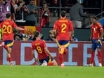 Spain's Fabian Ruiz scores celebrates with Lamine Yamal his side's second goal during a round of sixteen match between Spain and Georgia at the Euro 2024.