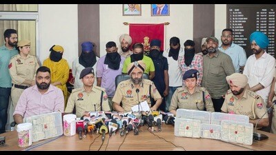 Commissioner of Police Ranjit Singh Dhillon addressing a press conference in Amritsar on Monday. (HT photo)
