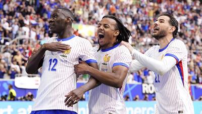 France players celebrate their goal against Belgium in the Round of 16 game in Dusseldorf. (AP)