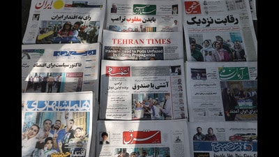 Newspapers with a cover picture of Iran's presidential election are seen in Tehran, Iran June 29, 2024. Majid Asgaripour/WANA (West Asia News Agency) (via REUTERS) Newspapers with a cover picture of Iran's presidential election are seen in Tehran, Iran June 29, 2024. Majid Asgaripour/WANA (West Asia News Agency) (via REUTERS)