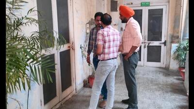 Punjab Vigilance Bureau members at the civil surgeon’s office in Sangrur on Monday. Punjab Vigilance Bureau members at the civil surgeon’s office in Sangrur on Monday.