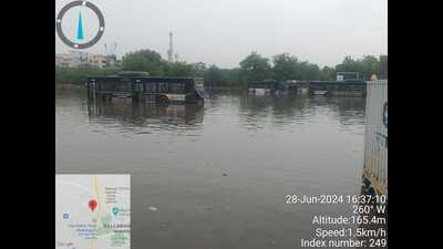 Such was the condition of the infrastructure that eight of the buses were submerged in water there after heavy rainfall on June 28. Six buses were pulled out with cranes and made functional after repairs but engines of the other two were still not working, officials said. (HT PHOTO) Such was the condition of the infrastructure that eight of the buses were submerged in water there after heavy rainfall on June 28. Six buses were pulled out with cranes and made functional after repairs but engines of the other two were still not working, officials said. (HT PHOTO)