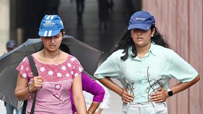 Visitors to Kartavya Path wear caps due to humid weather. (Vipin Kumar/HT Photo) Visitors to Kartavya Path wear caps due to humid weather. (Vipin Kumar/HT Photo)